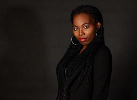 woman-dressed-in-black-on-a-black-background-free-photo